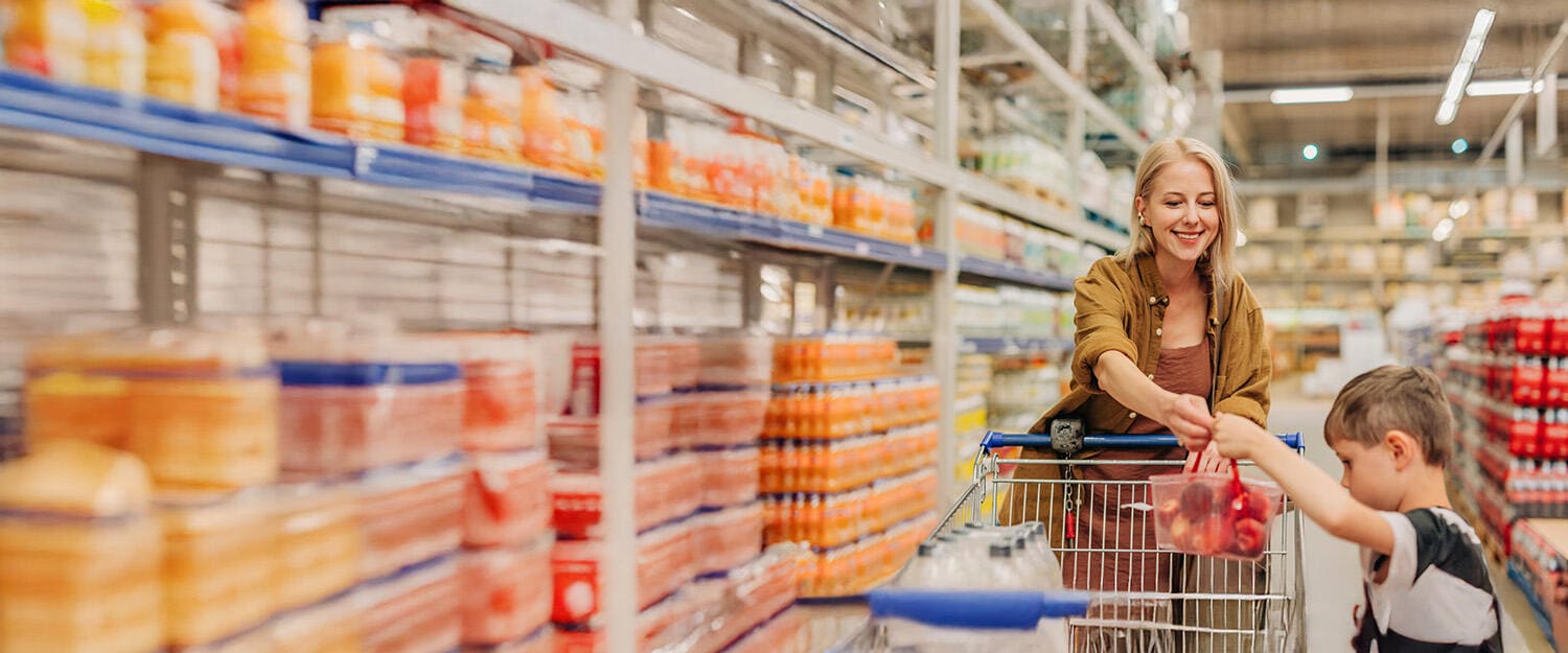 Retail Analytics and Consumer Goods Software Woman and child shopping