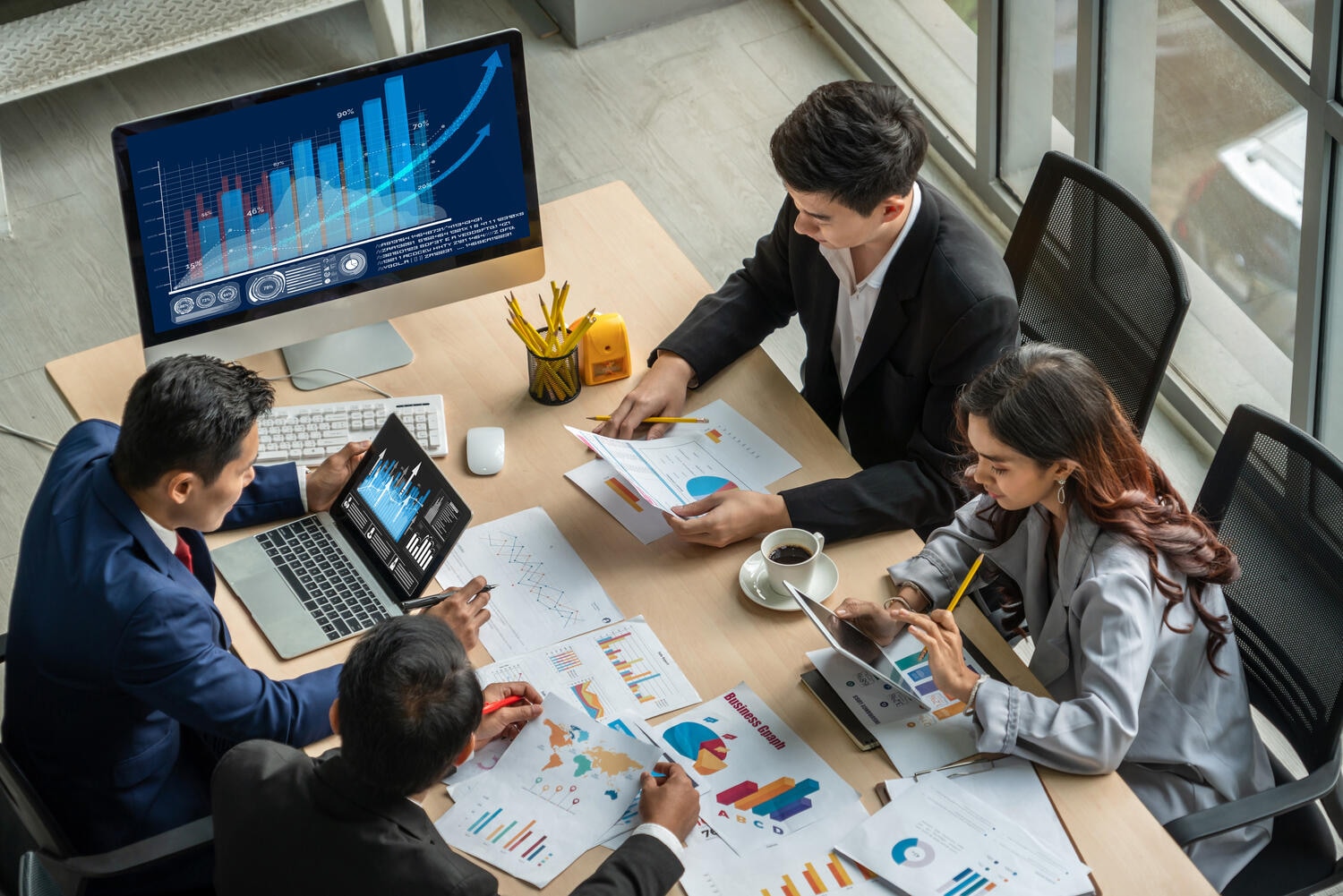 People analyzing data during meeting